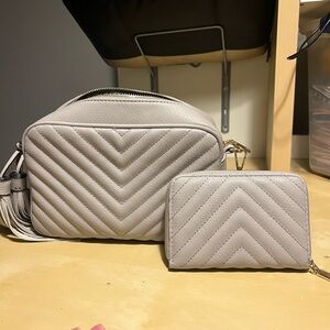 Grey cross body bag with wallet included. NWOT. Tassle can be removed